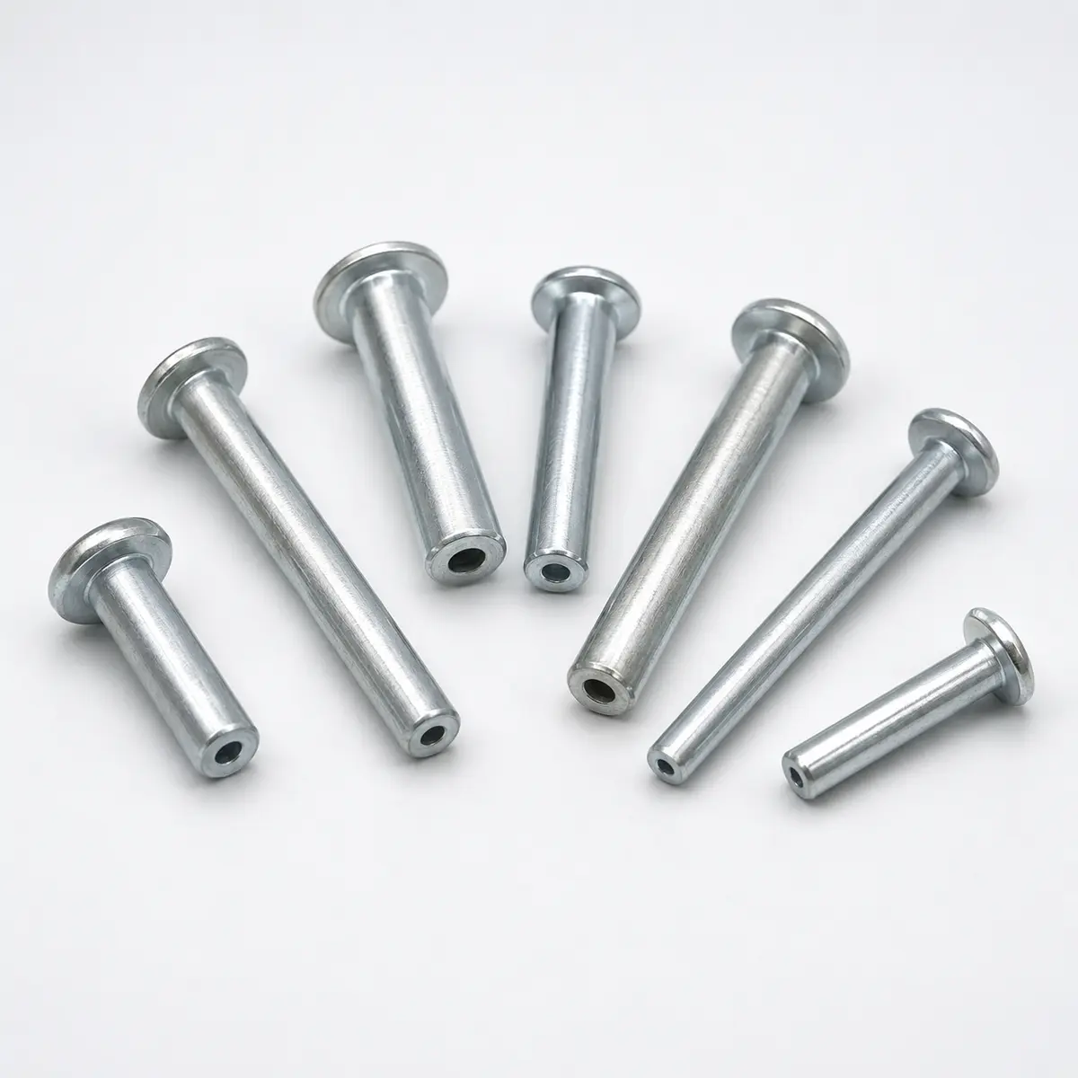 Semi-tubular rivets with partially hollow tail ends — XHT Fasteners