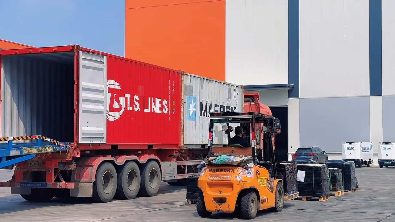 Container loading with wrapped pallets at a partner logistics location